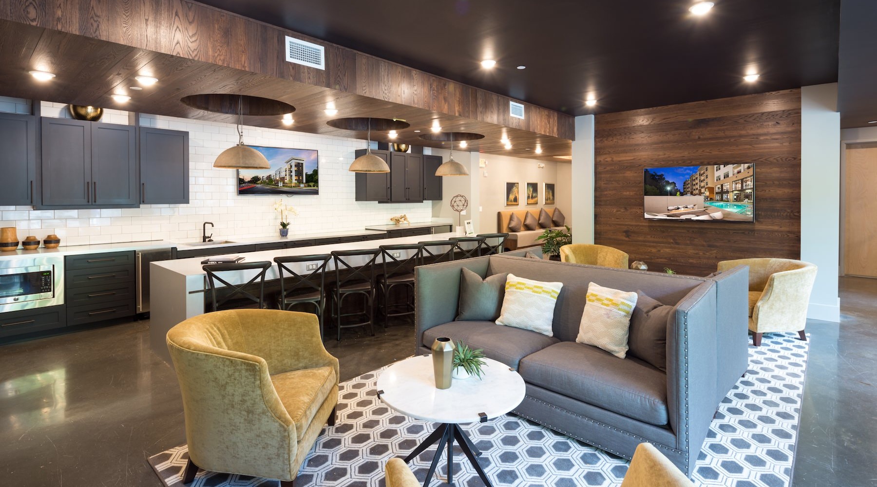 lounge with kitchen seating and tv