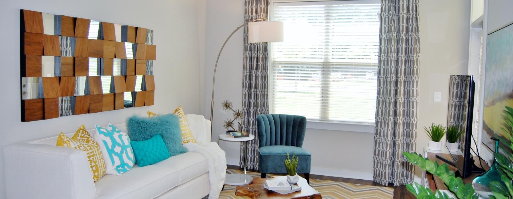 a living room with a couch and a table