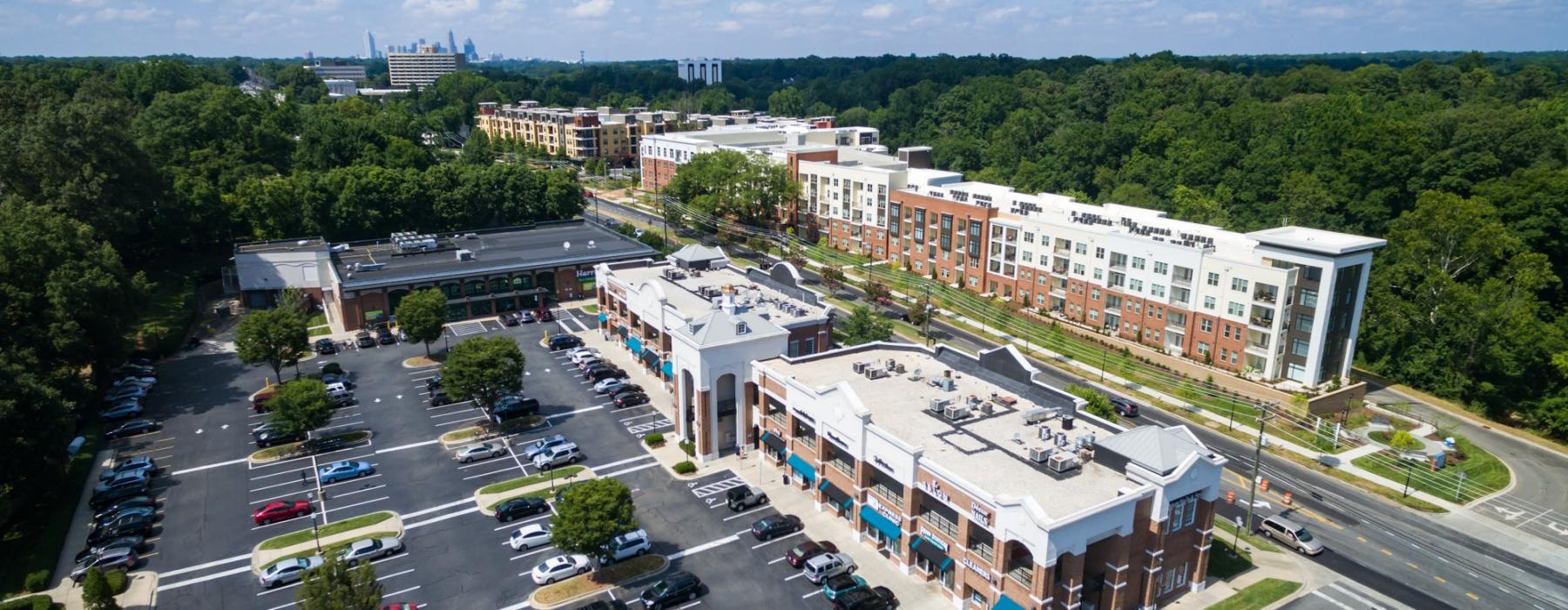 a large building with a parking lot